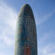 ARTstor, Jean Nouvel Architects, Torre Agbar, Placa de las Glories, Barcelona, view from below with grassy field in the foreground, 2005