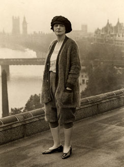 Jane Burr atop the Savoy Hotel with Houses of Parliament in distance, London, 1922 