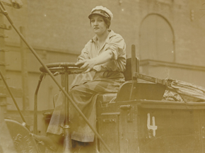 "One of longshore girls driving an auto truck."
            Photo by Underwood and Underwood, 1917