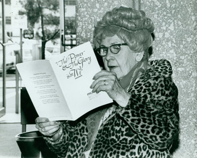 Delegate reading program for YWCA Convention