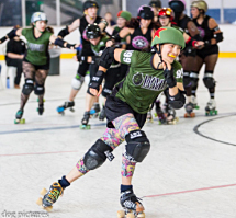 Roller derby jammer Myra Lam '11 rounds the track during a recent game.