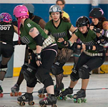 Diane Williams (on right) fends off an opposing competitor.