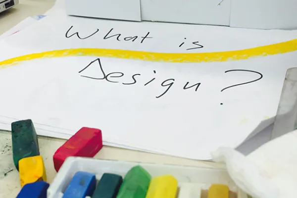 piece of paper with "What is design?" written on it