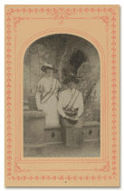 Isabella Mott (standing) and Eleanor Garrison in suffrage sashes, undated