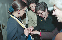 Ruth Bader Ginsburg showing off her medal backstage.