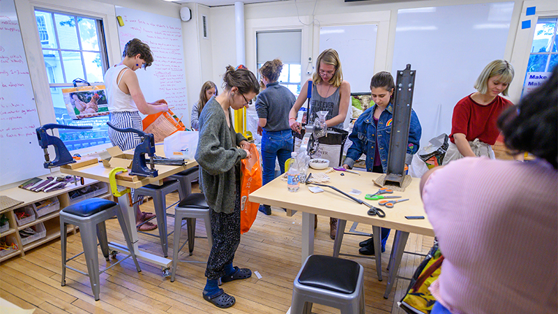 A group of students at a bag making workshop
