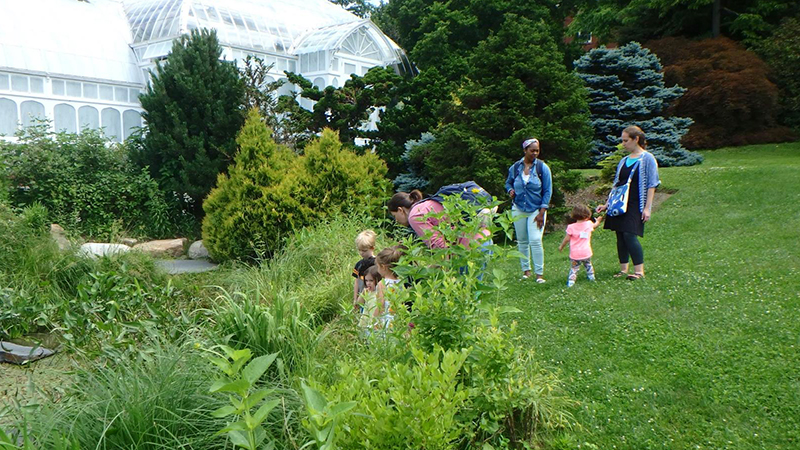 Group of Fort Hill children outside the Smith conservatory