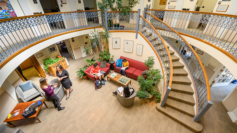 ariel view of jacobson center with spiral stair case and figures below