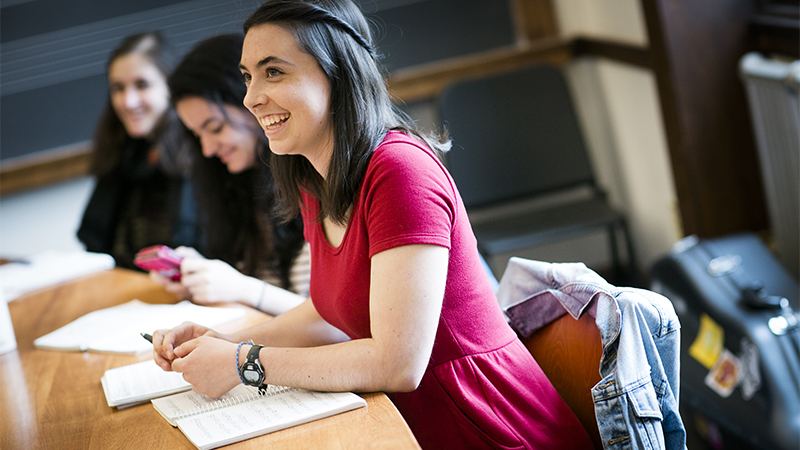 Photo of student smiling in class