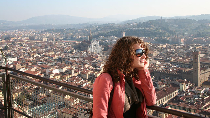 Photo of a student looking out at the skyline in Florence