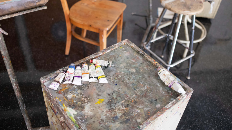 Tubes of paint on a table in Hillyer 211 painting studio