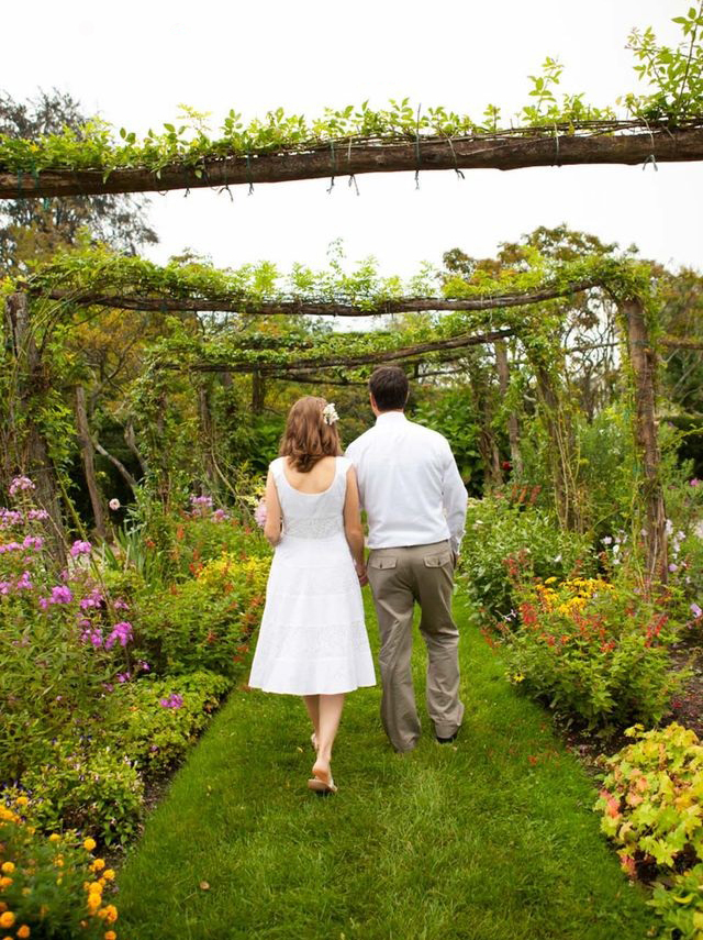 Married couple walking in Capen Garden