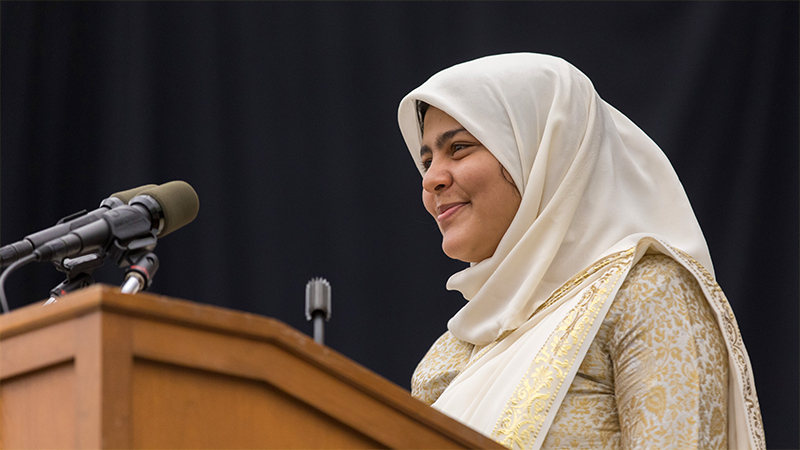 Zainab Rizvi at the podium