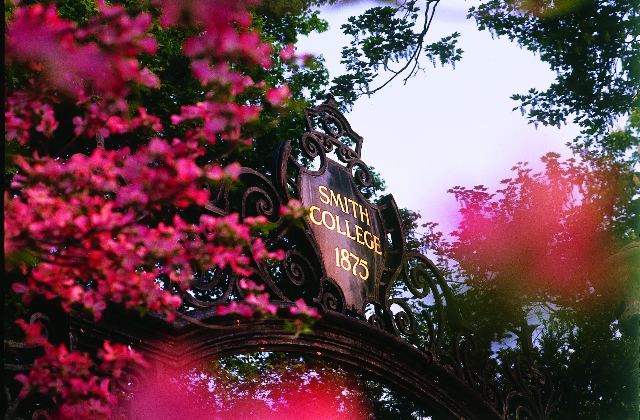 Grecourt Gates with pink flowers.