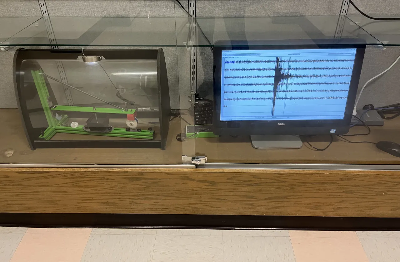A seismometer and seismograph with evidence of the earthquake activity
