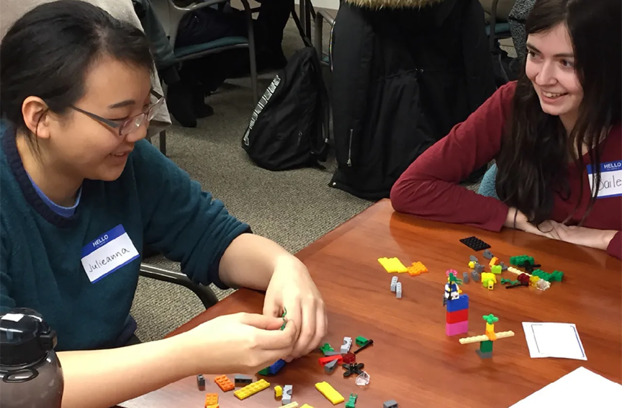Julieanna Niu '16 (left) and Bailey Vaillancourt '16 play with Legos during a recent workshop for this year's Smith engineering Design Clinic capstone course.