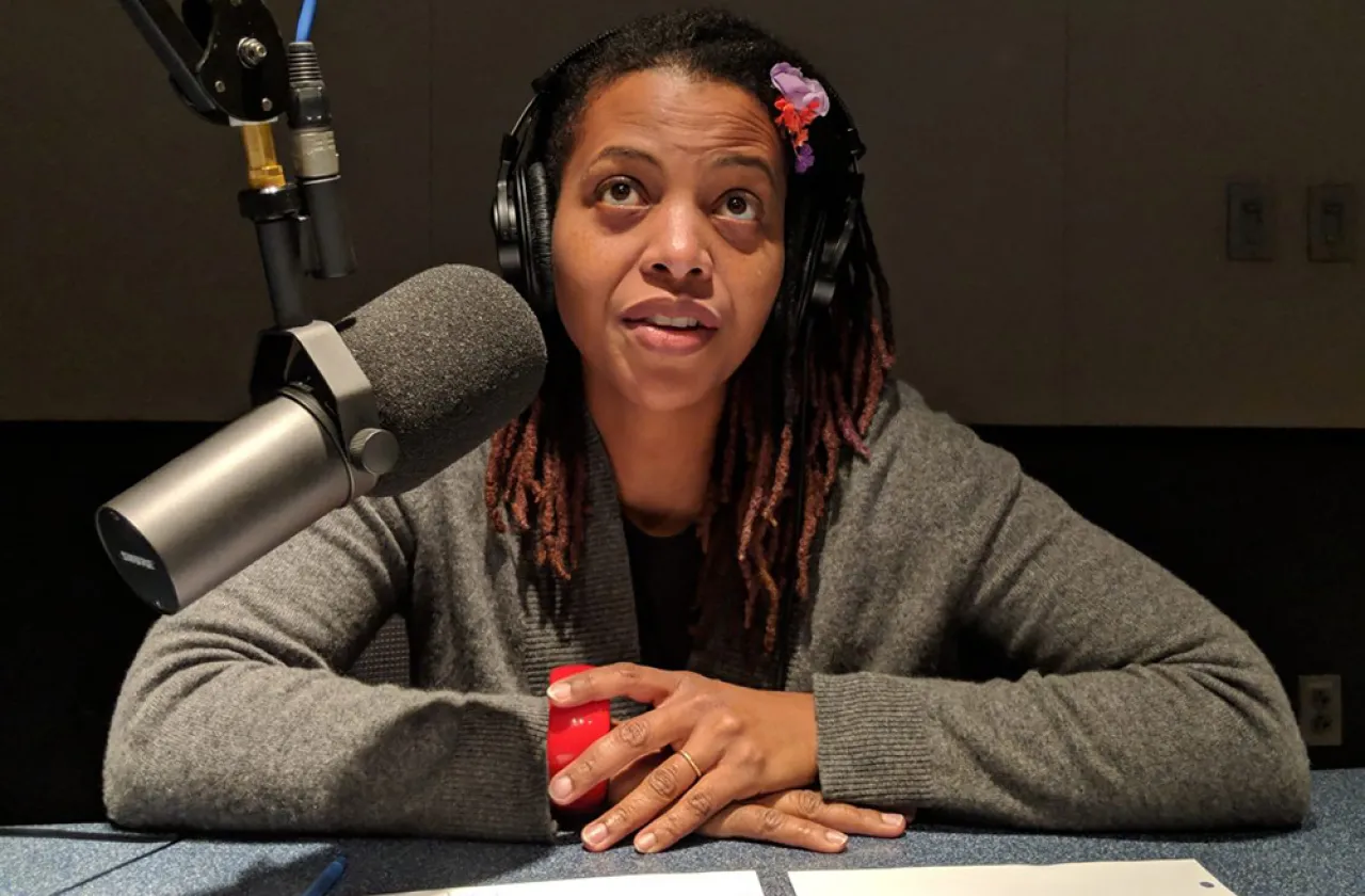 Lori Tharps at the microphone