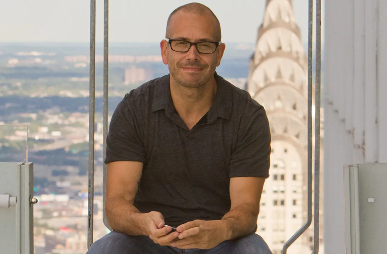 Mark Hansen photographed with the Chrysler Building in the background