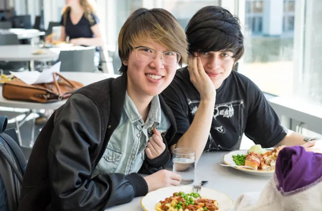 Two students eating