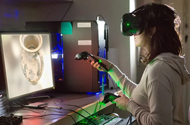 Student in the virtual reality room in the Imaging Center
