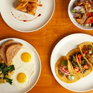 Four plates, apple galette, breakfast, tacos and grain bowl