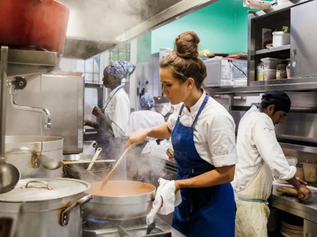 Alice Delcourt in her restaurant's kitchen
