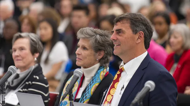 Melissa and Tim Draper watch student presentations
