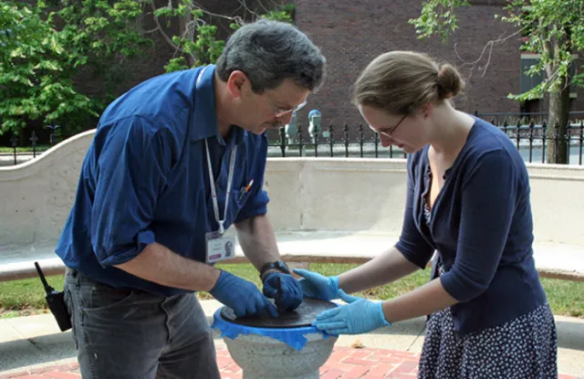 David Dempsey and Suzan Edwards align the sundial