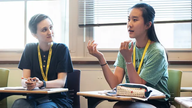 Students sitting in class, participating in the College Admission Workshop