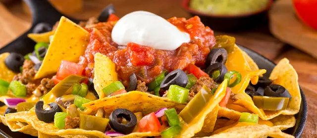 Plate of nachos with cheese