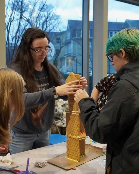 Engineering students building gingerbread skyscrapers