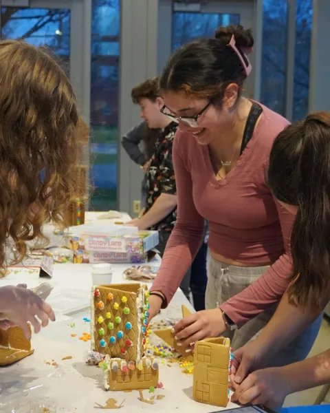 Engineering students building gingerbread skyscrapers