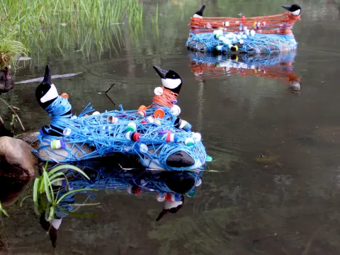 Duck Swan Goose sculpture on water