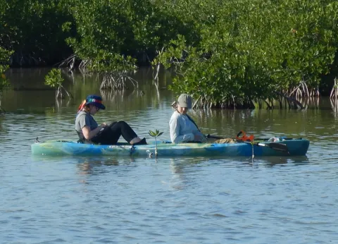 Two people in a kayak