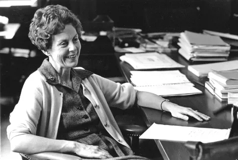 Jill Conway photographed at her desk
