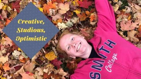 Maddie Wettach laying in autumn leaves. Overlay: "Creative, Studious, Optimistic"