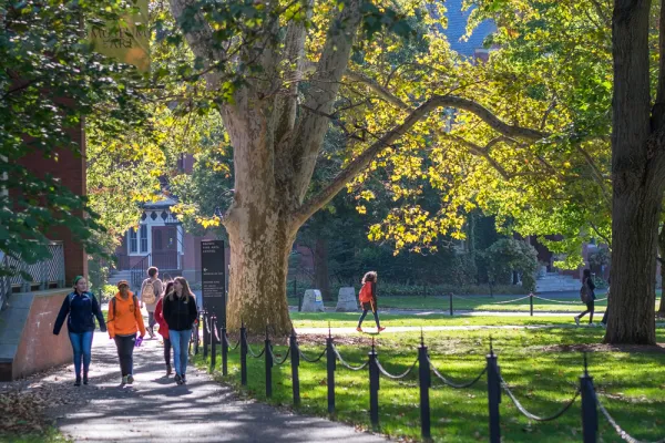 students walking outdoors in fall