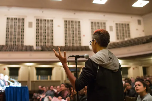 Student at mic in John M. Green Hall