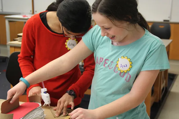 Two middle schoolers experimenting