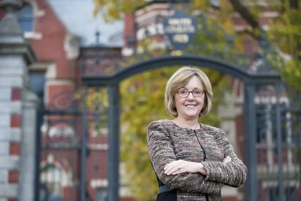 Kathleen McCartney in front of the Grecourt Gate