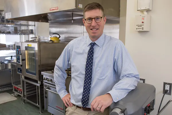 Andy Cox in a house kitchen
