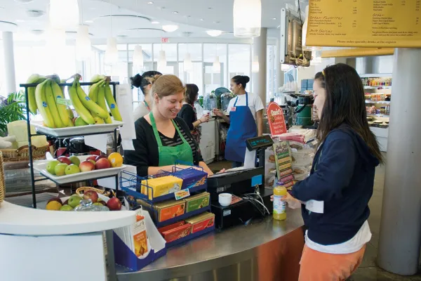 Student making a purchase at the campus center register