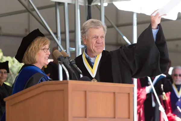 Kathleen McCartney and Don Baumer at the podium