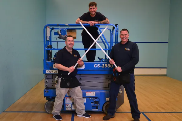 Smith electricians Robert Dunn, Joshua Nietupski and Rene Coderre