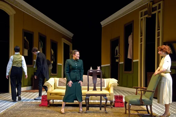 Four actors on stage in a production of A Doll's House