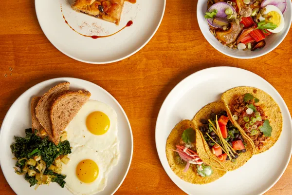 Four plates, apple galette, breakfast, tacos and grain bowl