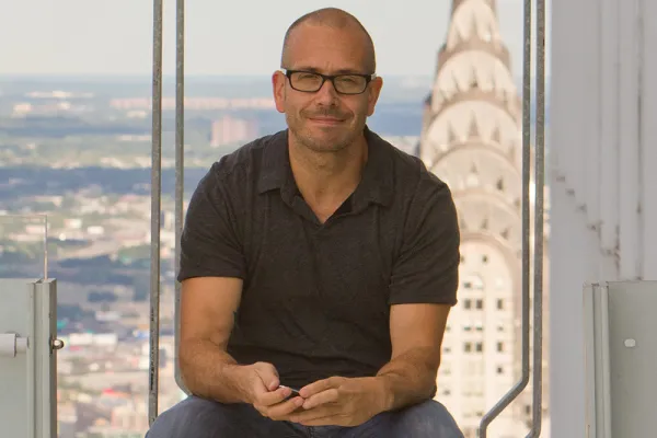 Mark Hansen photographed with the Chrysler Building in the background