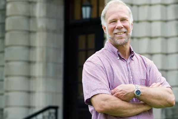 Peter Gregory in front of Seelye Hall