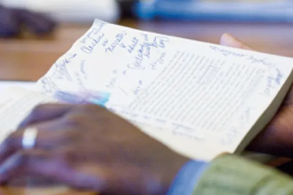 hands holding a book