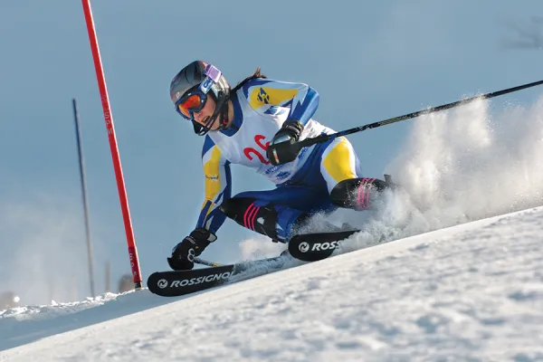 Student skiing in a competition